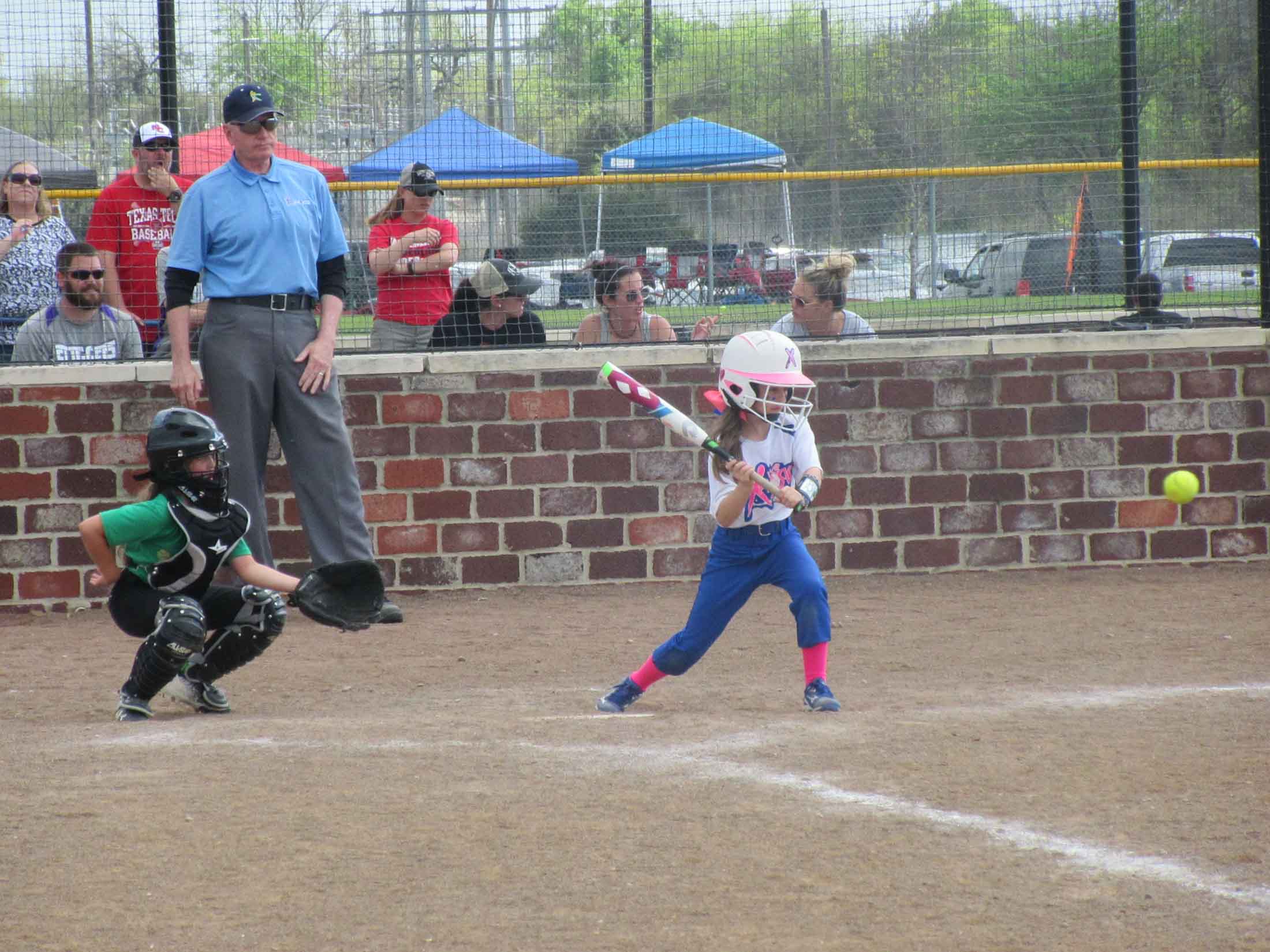 Girl hitting the ball